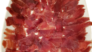 Finely sliced venison